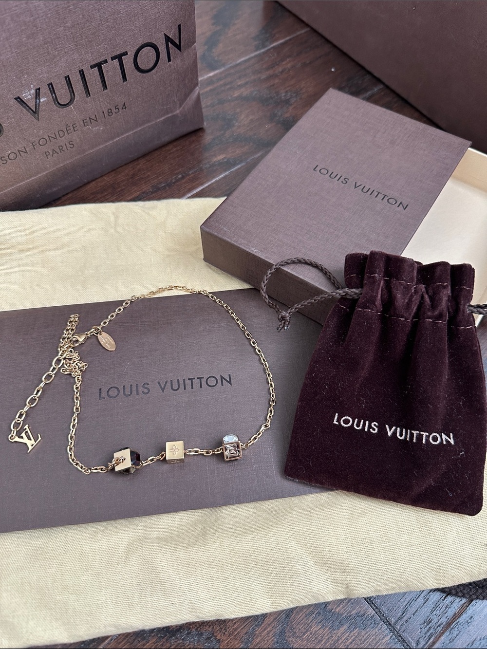 Louis Vuitton Gold Cube Charm Necklace with Black and Clear Accents